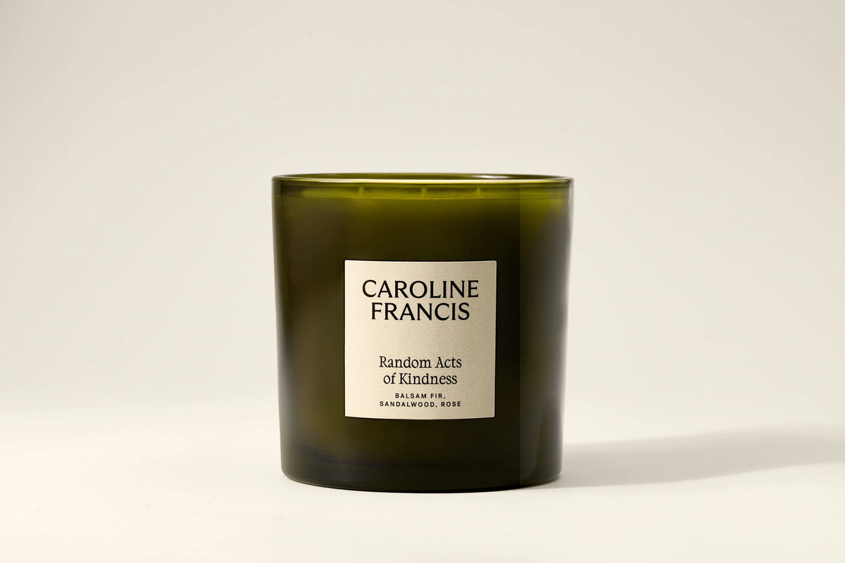 Random Acts of Kindness 30oz scented candle in olive green glass with a cream label by Bungalow Furniture &amp; Accessories.
