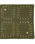 Olive green KR Cashmere Bandana in featherweight cashmere with cream hearts and frayed edges.
