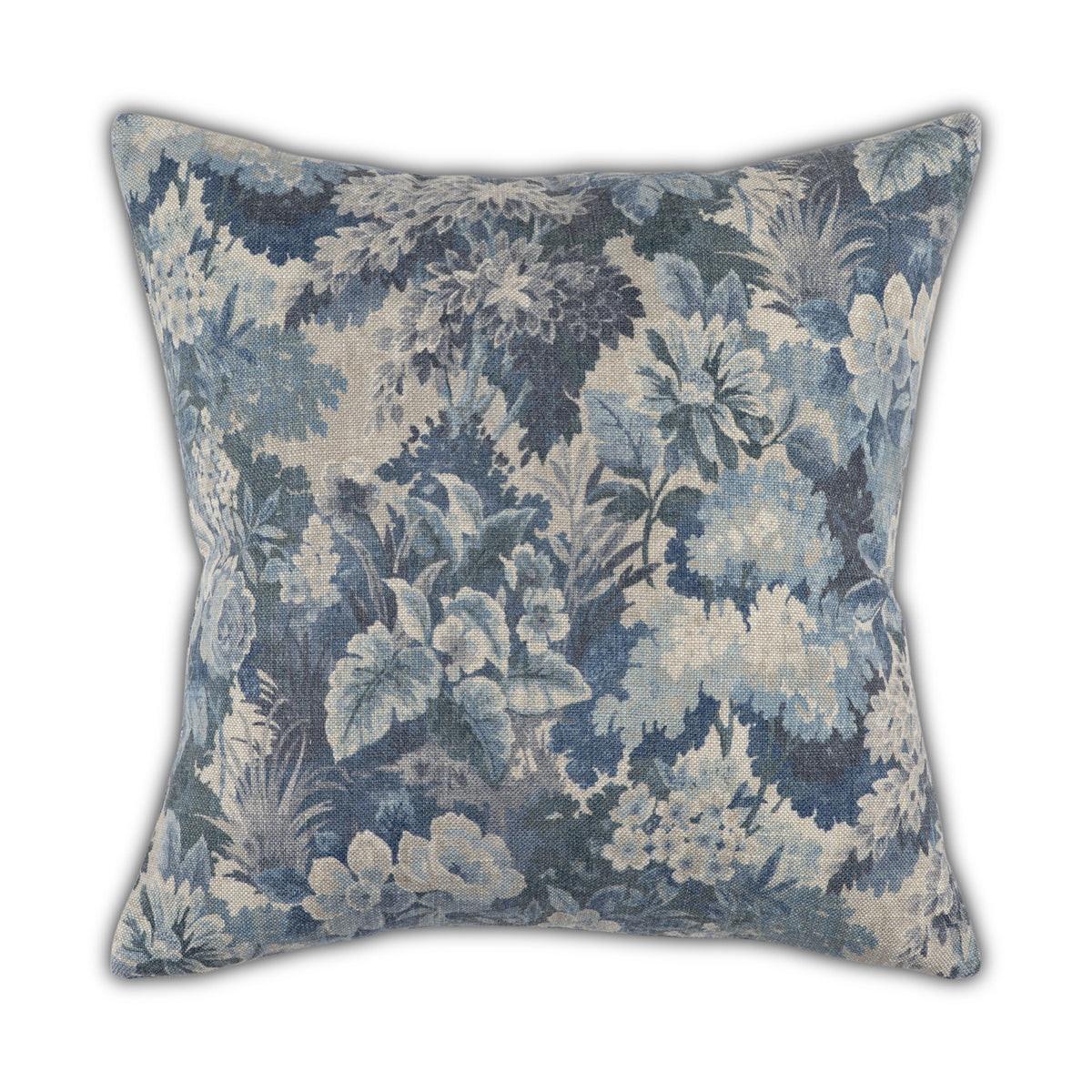 The Daphne Pillow by Moss Studio features painterly blue and gray vintage-inspired florals and leaves on a textured, linen-look white background.