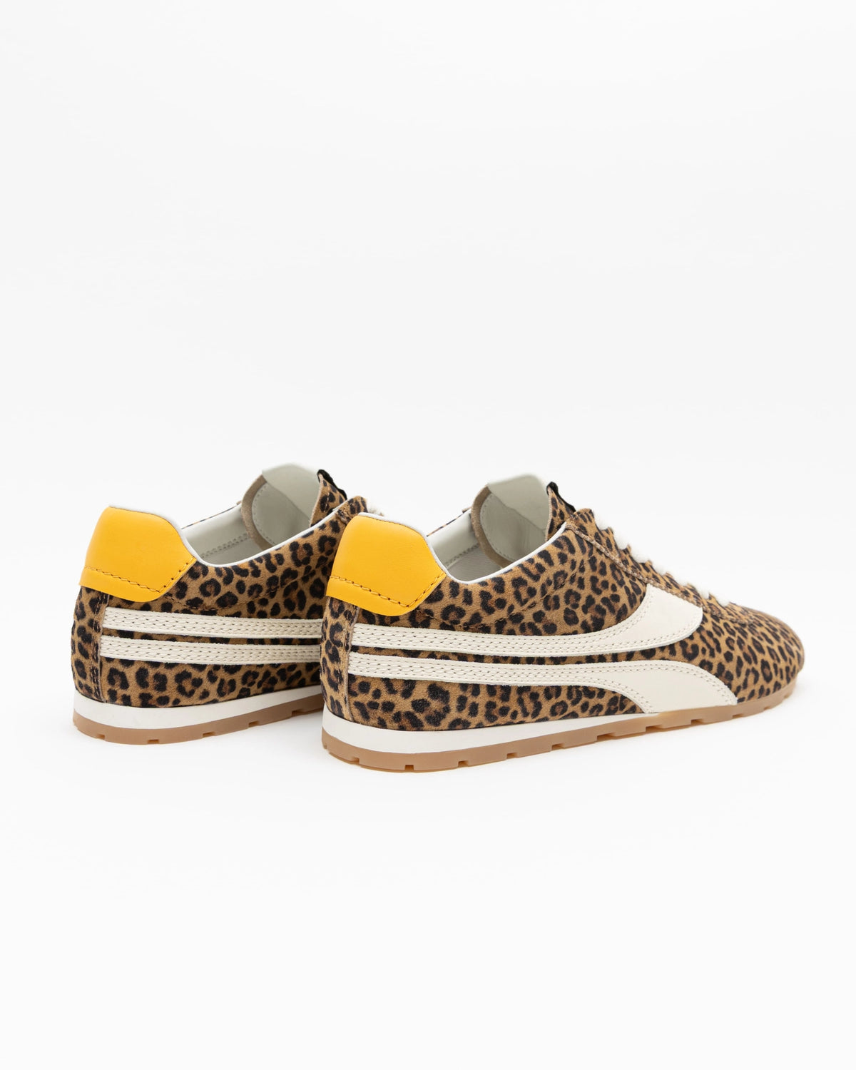 The ONCEPT Essex Sneaker features a leopard print, cream accents, yellow heels, and light brown soles in premium Italian calf suede—ultra-lightweight and shown against a white background.