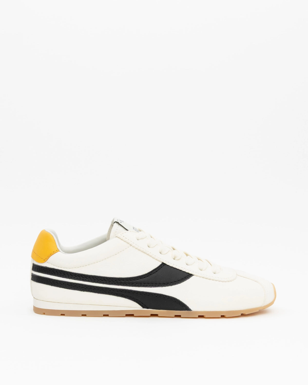 The Essex Sneaker by ONCEPT features white ultra-lightweight Italian calf suede, a black side stripe, yellow heel tab, white laces, and a tan rubber sole. Displayed on a plain white background.
