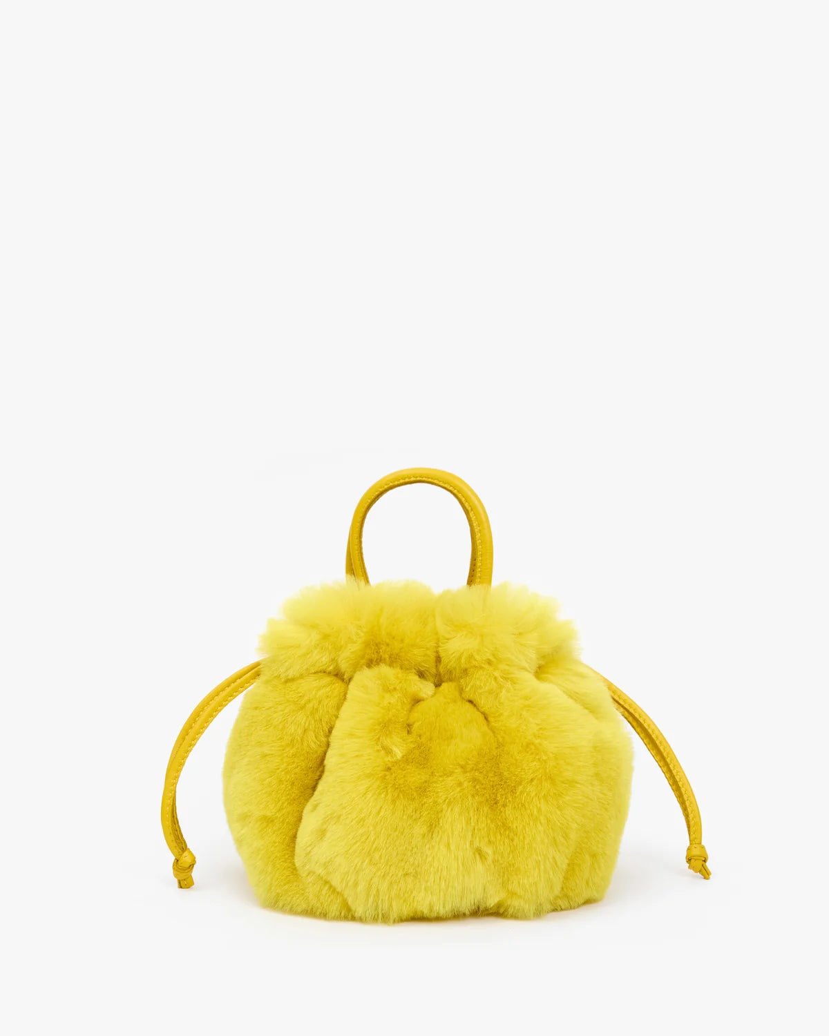 Bright yellow shearling Emma drawstring bag with top handle by Bungalow Furniture &amp; Accessories.
