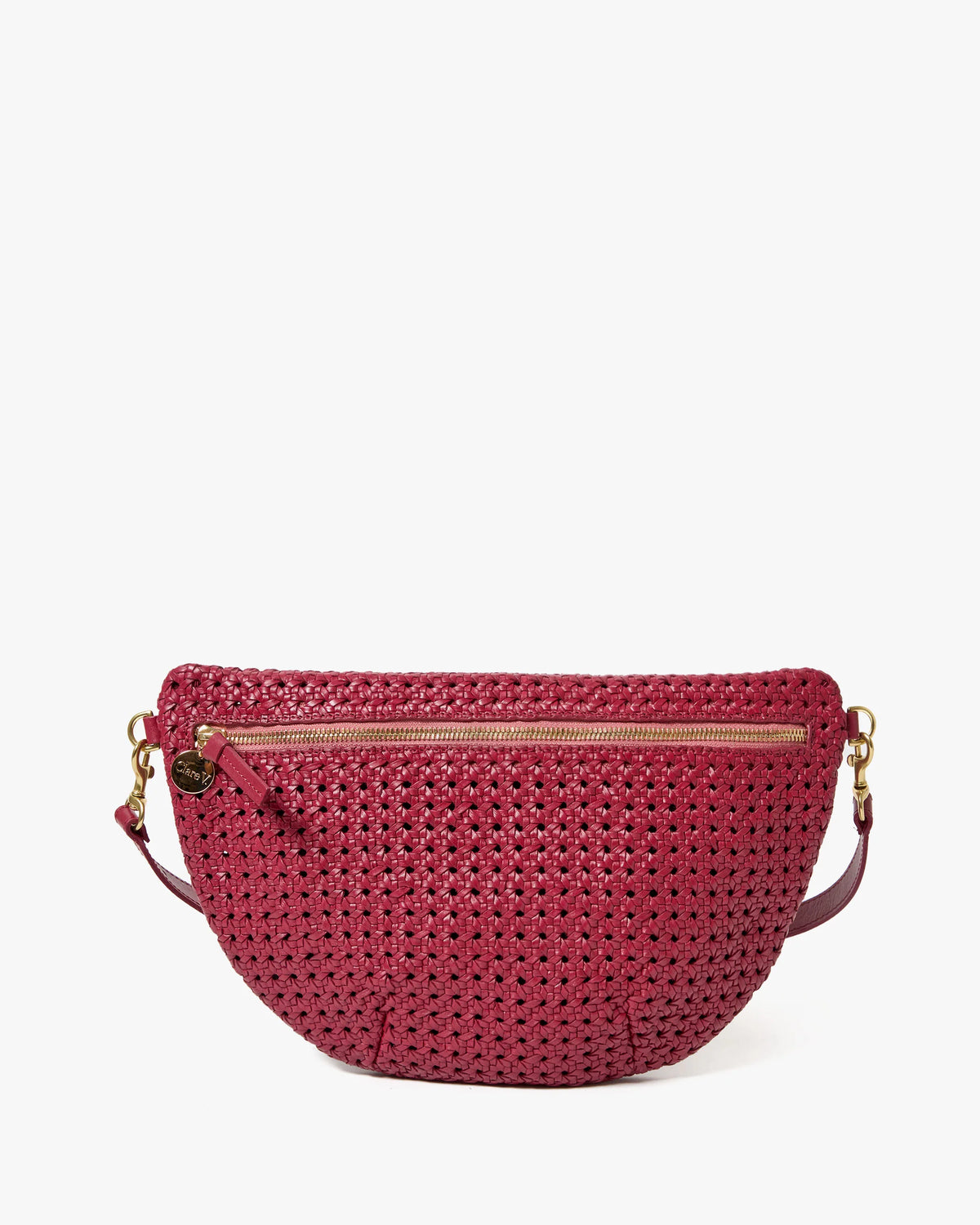 The Grande Fanny S26 by Clare Vivier is a red handwoven leather crossbody bag with a front zipper pocket, round gold charm, and gold hardware on the detachable strap, shown against a plain white background.