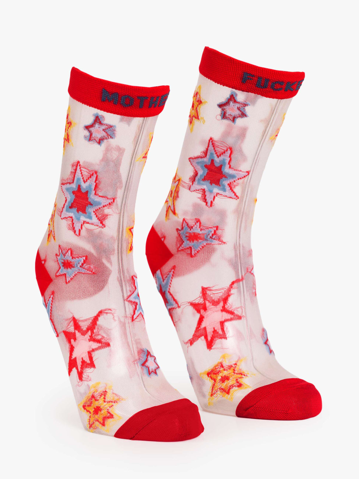 The Step Up Sock by Mother: translucent grey socks with bold red toes, heels, and cuffs, plus colorful starbursts. “MOTHER” is on one cuff and “F***ER” on the other.