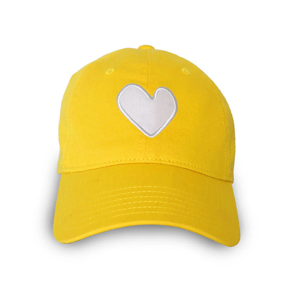 The Kerri Rosenthal KR Imperfect Heart Hat is a bright yellow cap with an embroidered tonal heart patch on the front, shown against a white background.