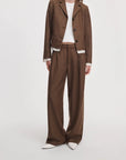 Lawrence tailored pants by Rag & Bone in brown striped herringbone wool-blend, styled with a matching blazer.