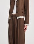 Lawrence tailored pant in brown herringbone from Rag & Bone, styled with a matching blazer and white top.
