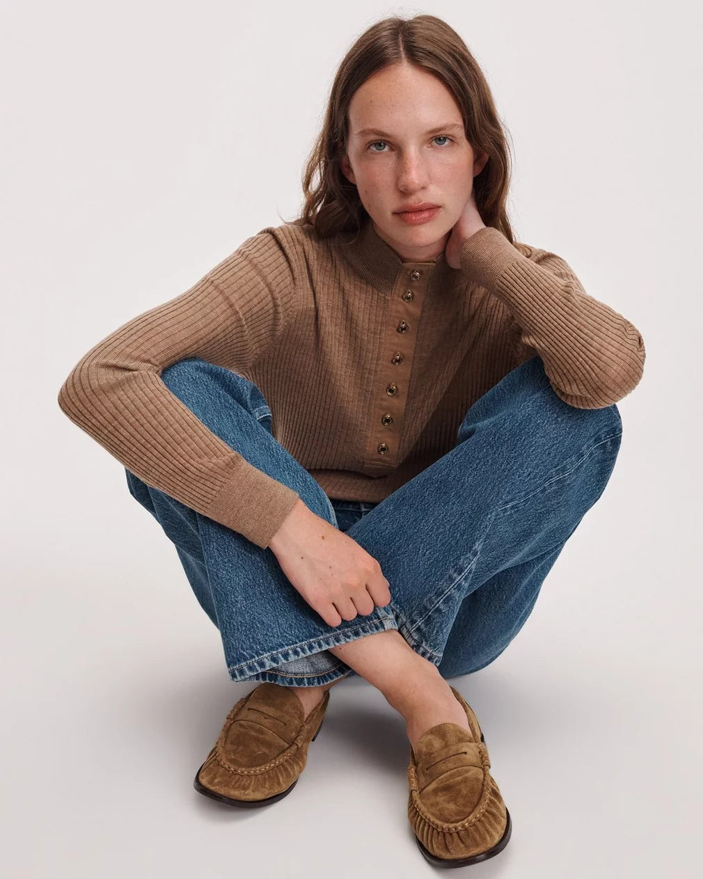 Rag & Bone Lexi loafers in a casual setting, styled with jeans and a brown sweater for a relaxed, modern look.