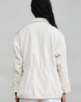 Back view of a cream Denimist Utility Field Jacket with a cinched waist.