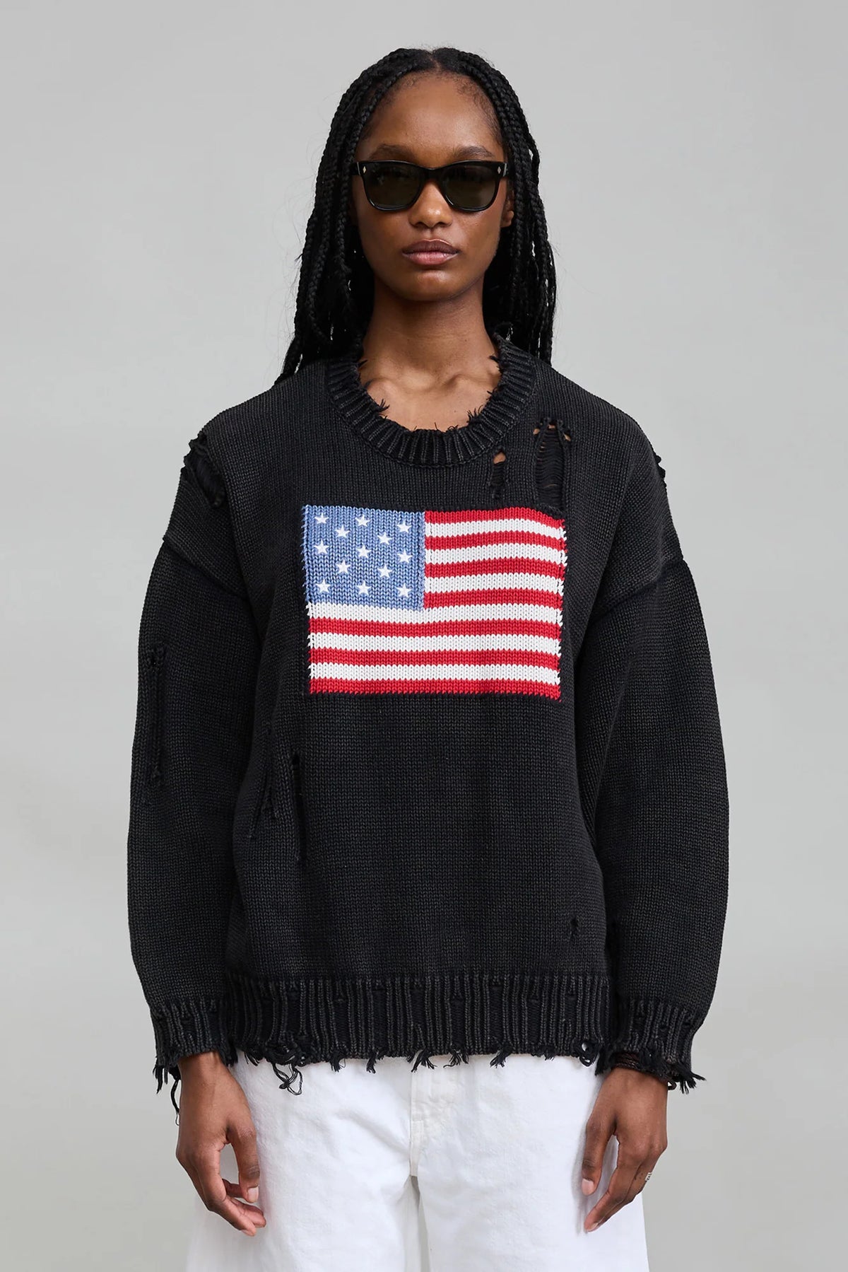 Distressed black American flag sweater by Denimist featuring a chest graphic.