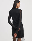 Luca Shadow LS jersey top with sheer mesh sleeves and sequined fringe skirt.