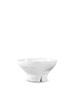 The Catchall Bowl No 257 by Montes Doggett is a white, high-fired ceramic bowl with an irregular, slightly uneven shape and a small split at the base, shown against a plain white background.