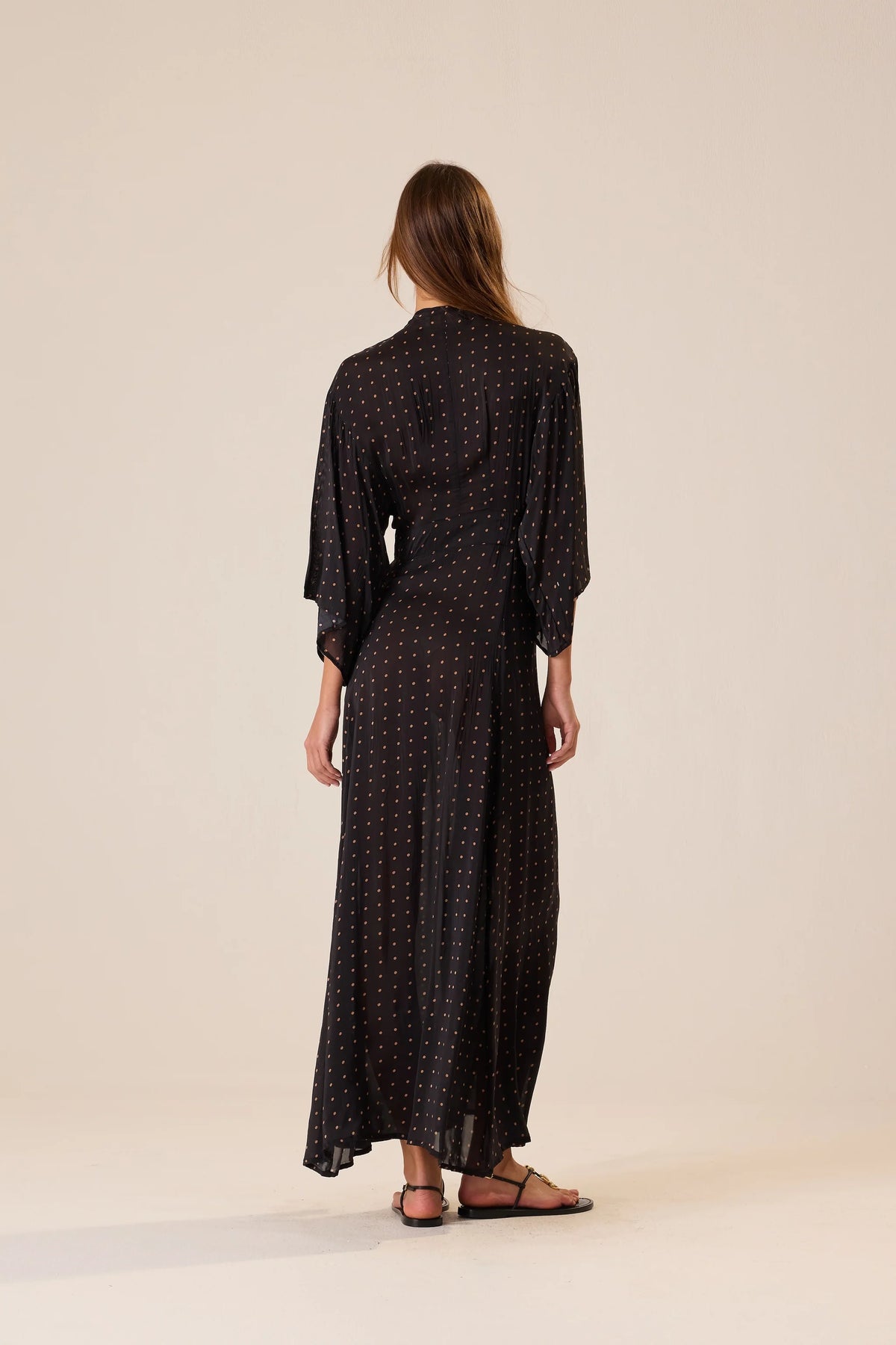 Natalie Martin Sarah Dress in dark polka-dot print, kimono style, shown from the back at Bungalow Furniture.