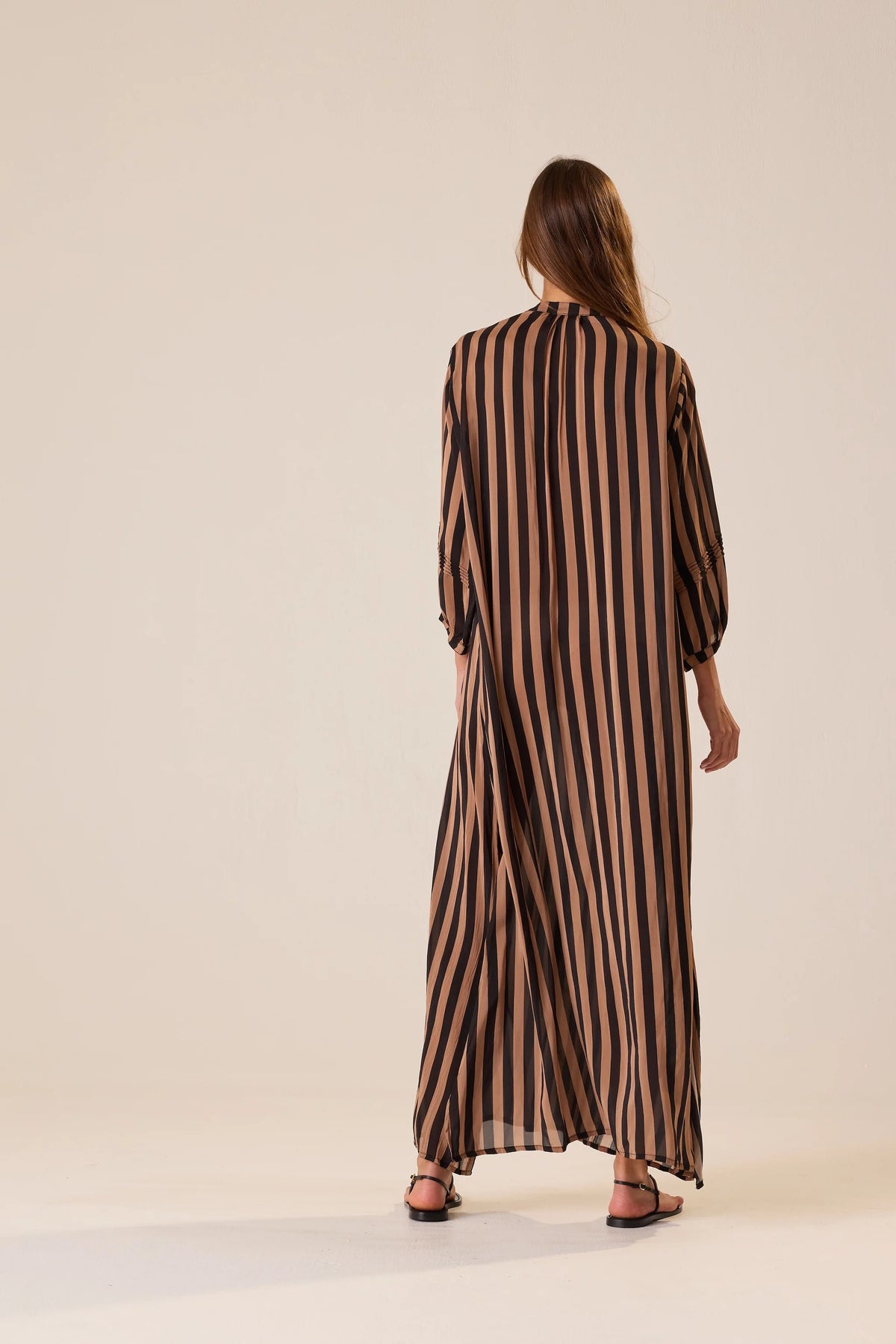 Striped cotton v-neck Sammie Maxi Dress by Natalie Martin, back view, modeled for Bungalow Furniture & Accessories.