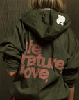 Free City LifeNatureLove RTU Ziphood Jacket in pink, back view, lifestyle styling for Bungalow Furniture & Accessories.