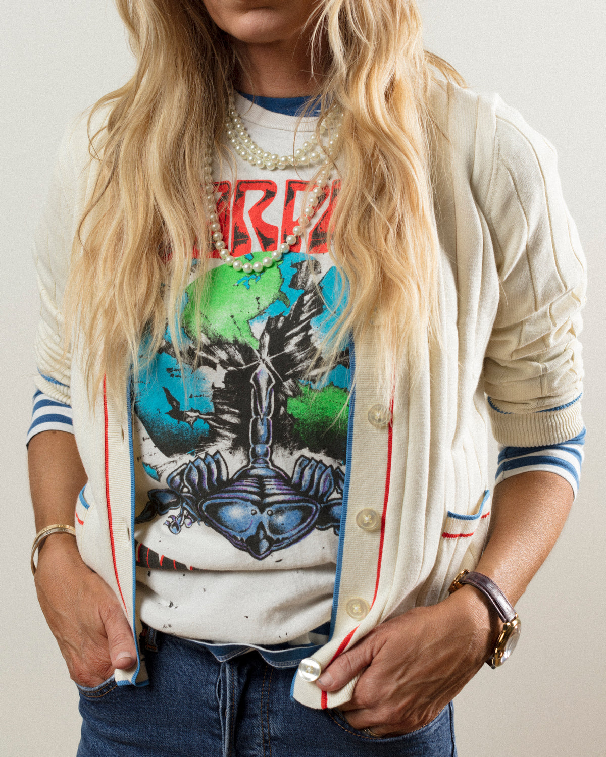 Cream cardigan and graphic tee styled with layered necklaces, perfect for a casual, modern Bungalow look.