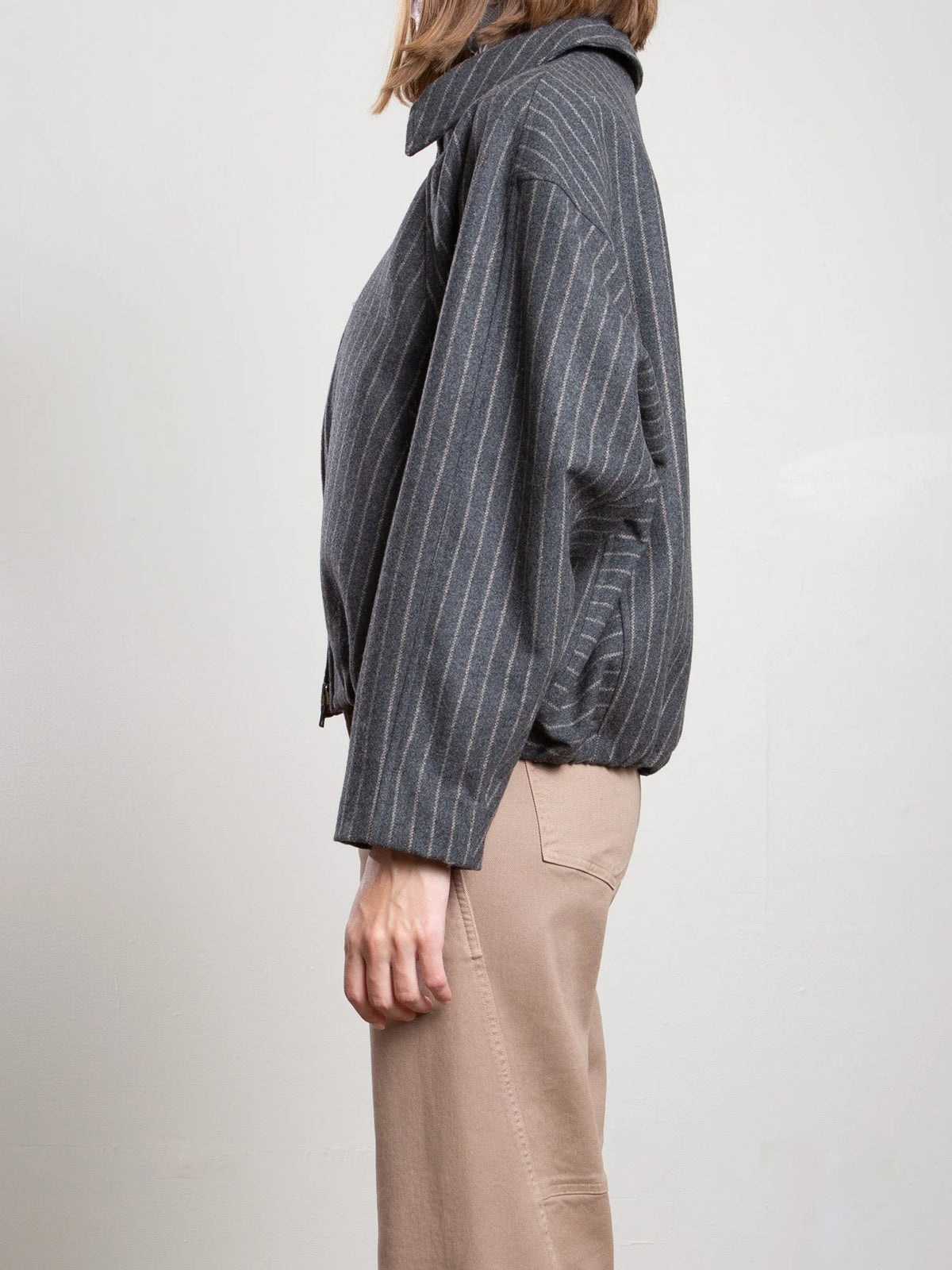 Pharaoh Andre Bomber Jacket in wool pinstripe with beige pants, Bungalow Furniture &amp; Accessories, modern style.