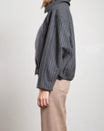Pharaoh Andre Bomber Jacket in wool pinstripe with beige pants, Bungalow Furniture & Accessories, modern style.