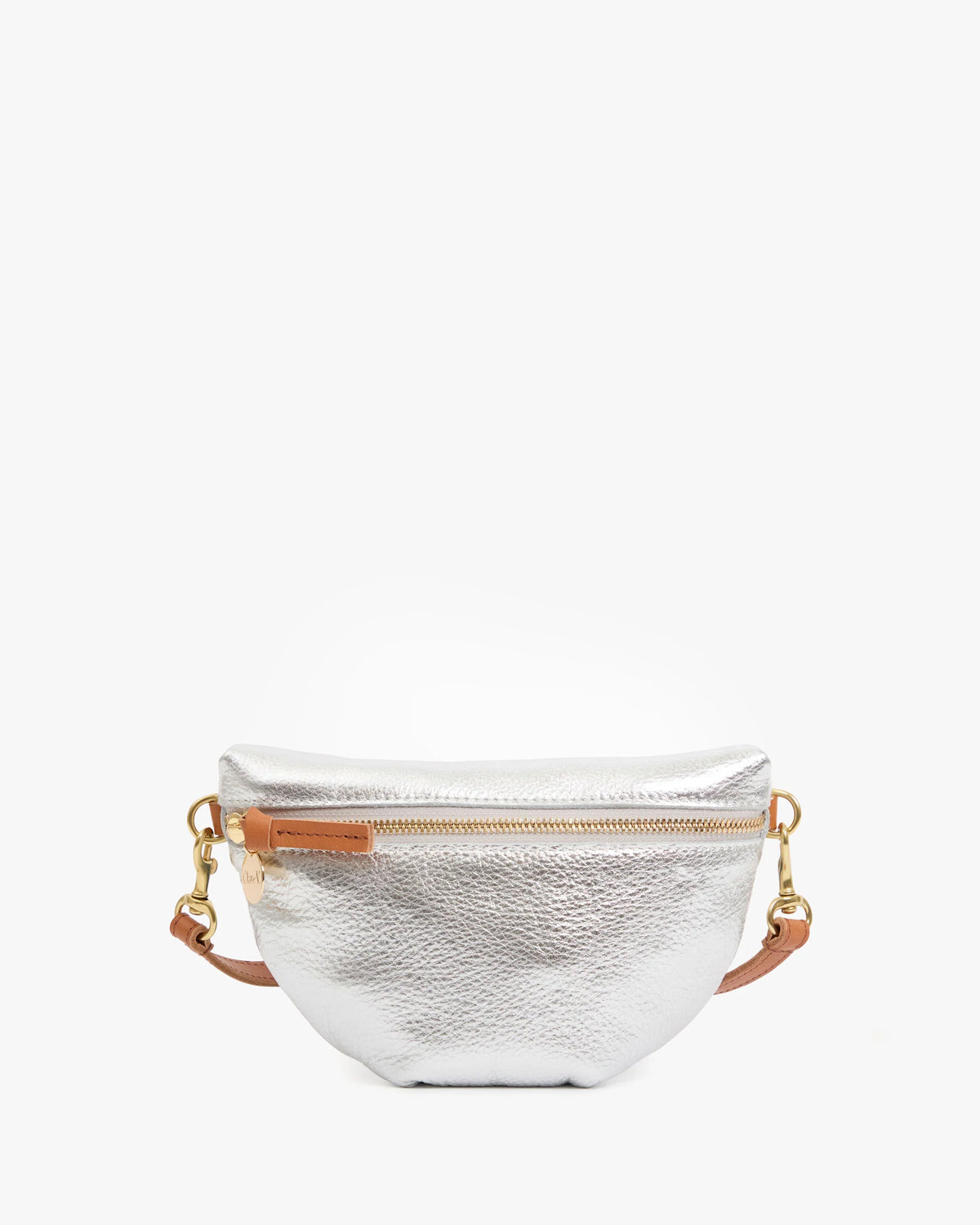 The Clare Vivier Petite Fanny S26 is a small, metallic silver leather crossbody bag featuring a front zipper, gold hardware, and an adjustable strap for hands-free use, shown against a plain white background.