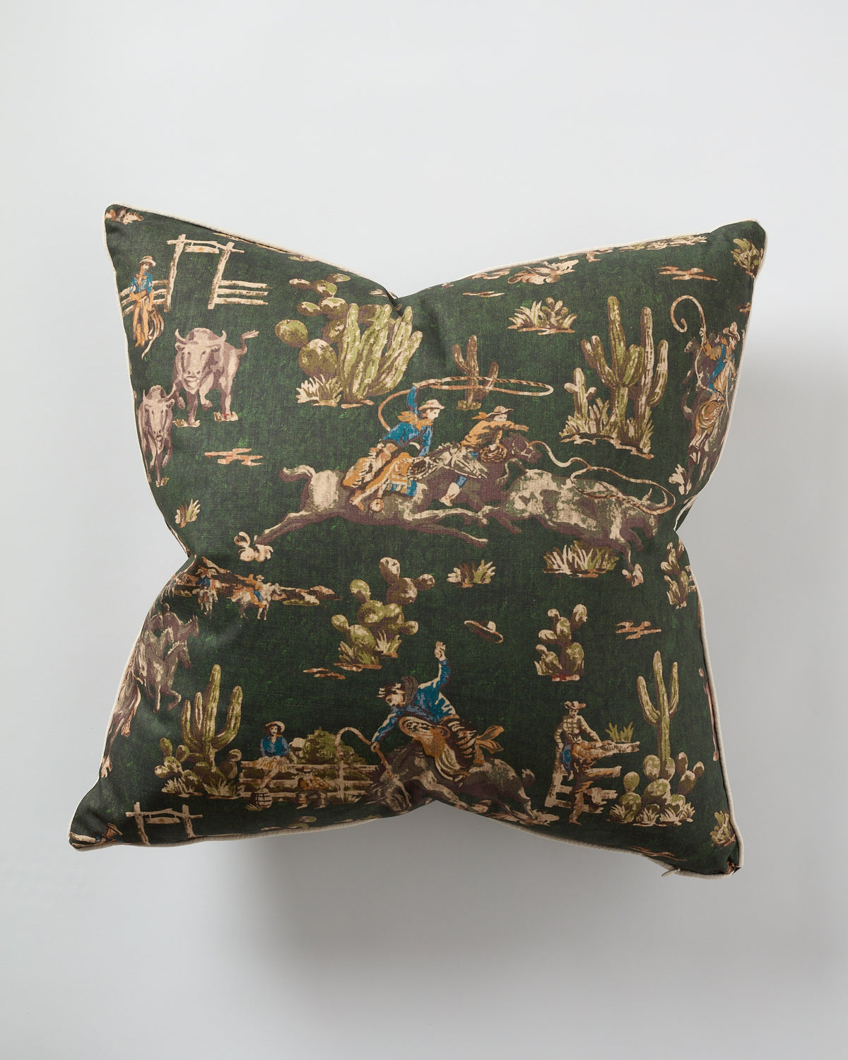 The Green Cowboy Pillow 26x26 by Design Legacy features a dark green vintage western pattern with cowboys, cattle, and cacti on white—ideal as a custom accent for rustic or western-inspired decor.
