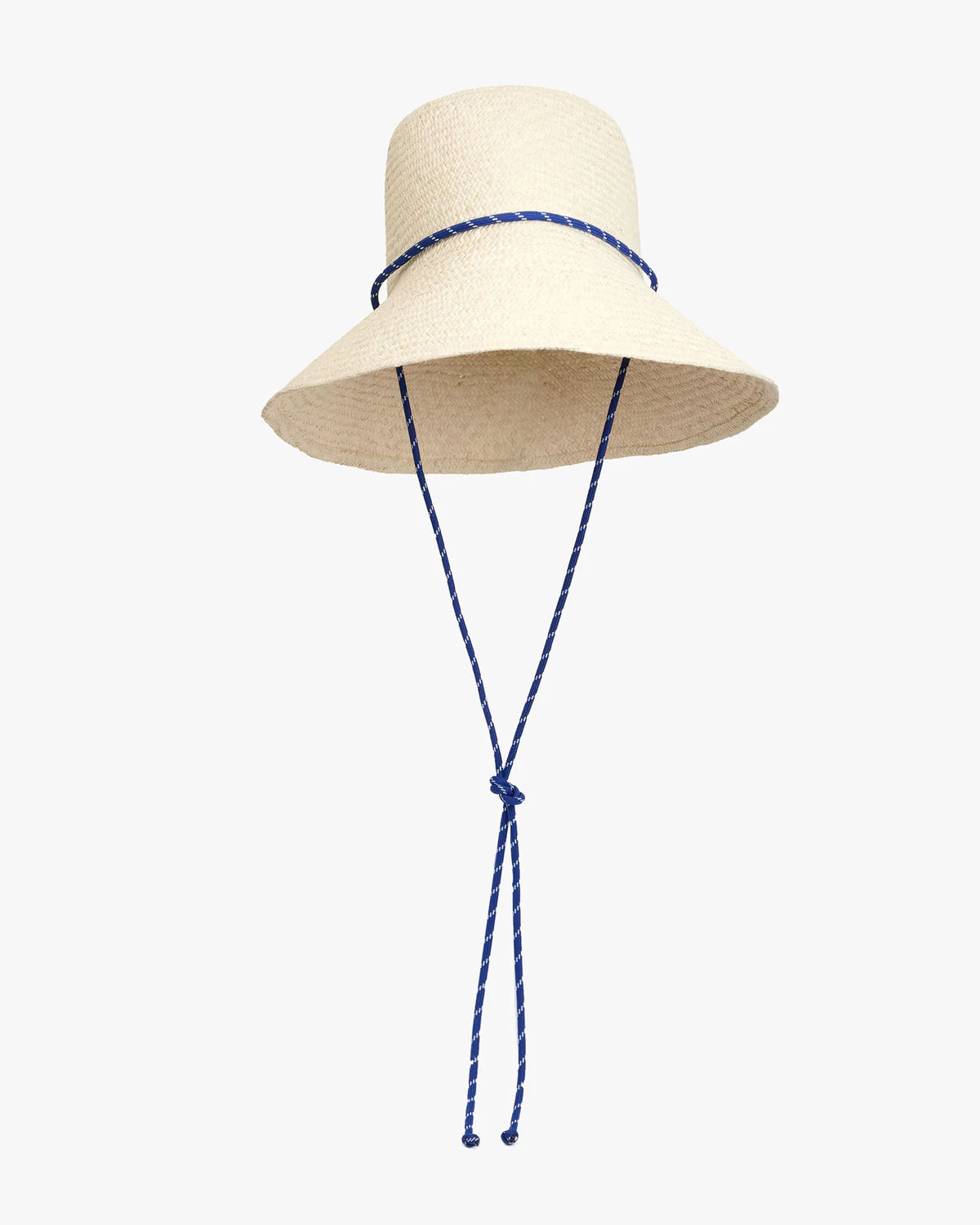Natural straw rattan Romy hat with blue sail cord chin strap by Clare Vivier on white background.