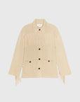 Natural sweater jacket with fringe and front pockets by The Great Inc., Western Fringe style, shown on white background.