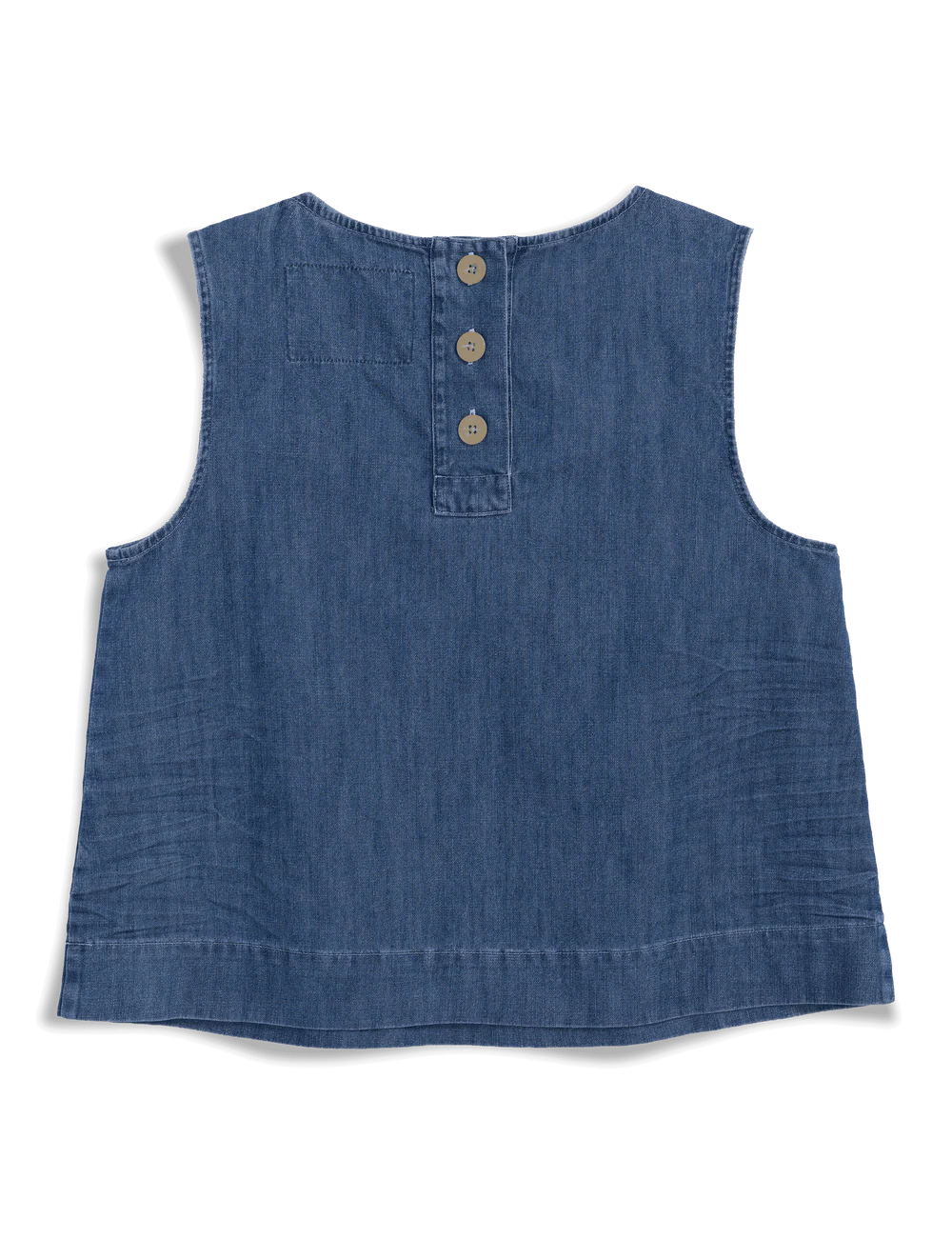 The Shell Tank by Frank & Eileen features soft indigo denim, a sleeveless design, horn buttons along the upper back, and a patch detail on the left shoulder. A gently curved hem gives this tank its stylishly casual look.