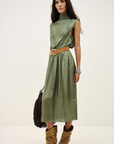 BA&SH Celea dress styled with tan boots and a brown fringed bag, perfect for a chic, contemporary look.