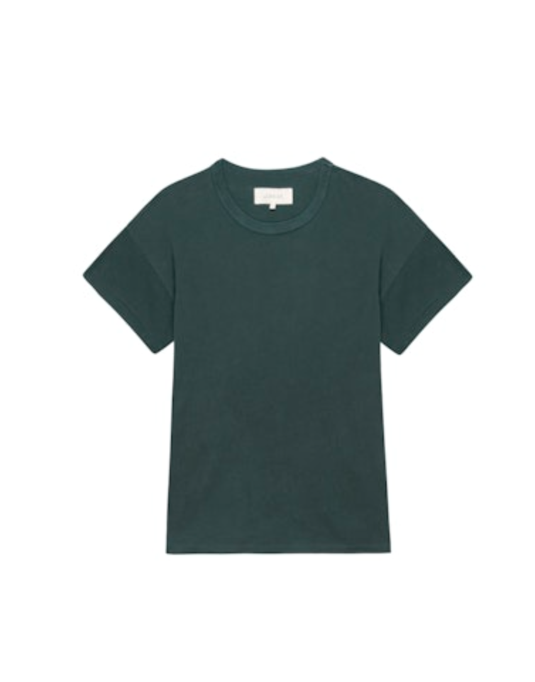 A plain, dark green, short-sleeve T-shirt with a round neckline is displayed against a white background. The T-shirt appears simple and casual, reminiscent of vintage tees and made from a comfortable fabric. It’s called The Boxy Crew by The Great Inc.