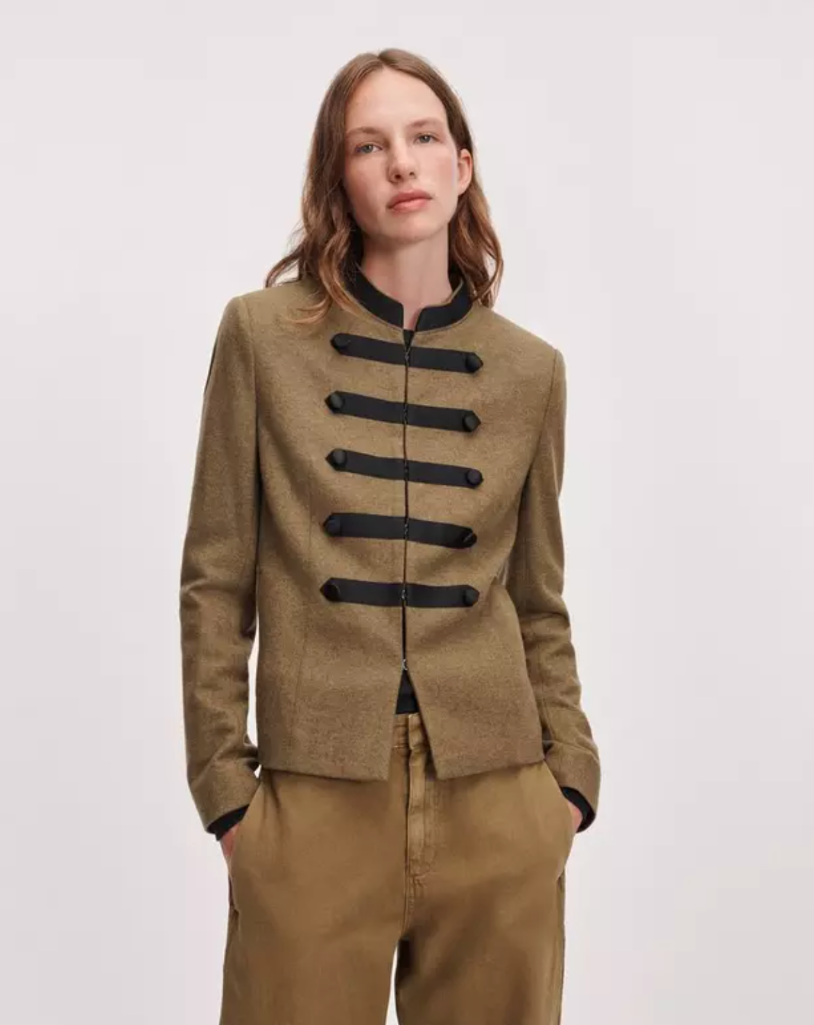 Mercer Regalia Blazer by Rag &amp; Bone in dark fabric, paired with tan pants, styled against a simple backdrop.