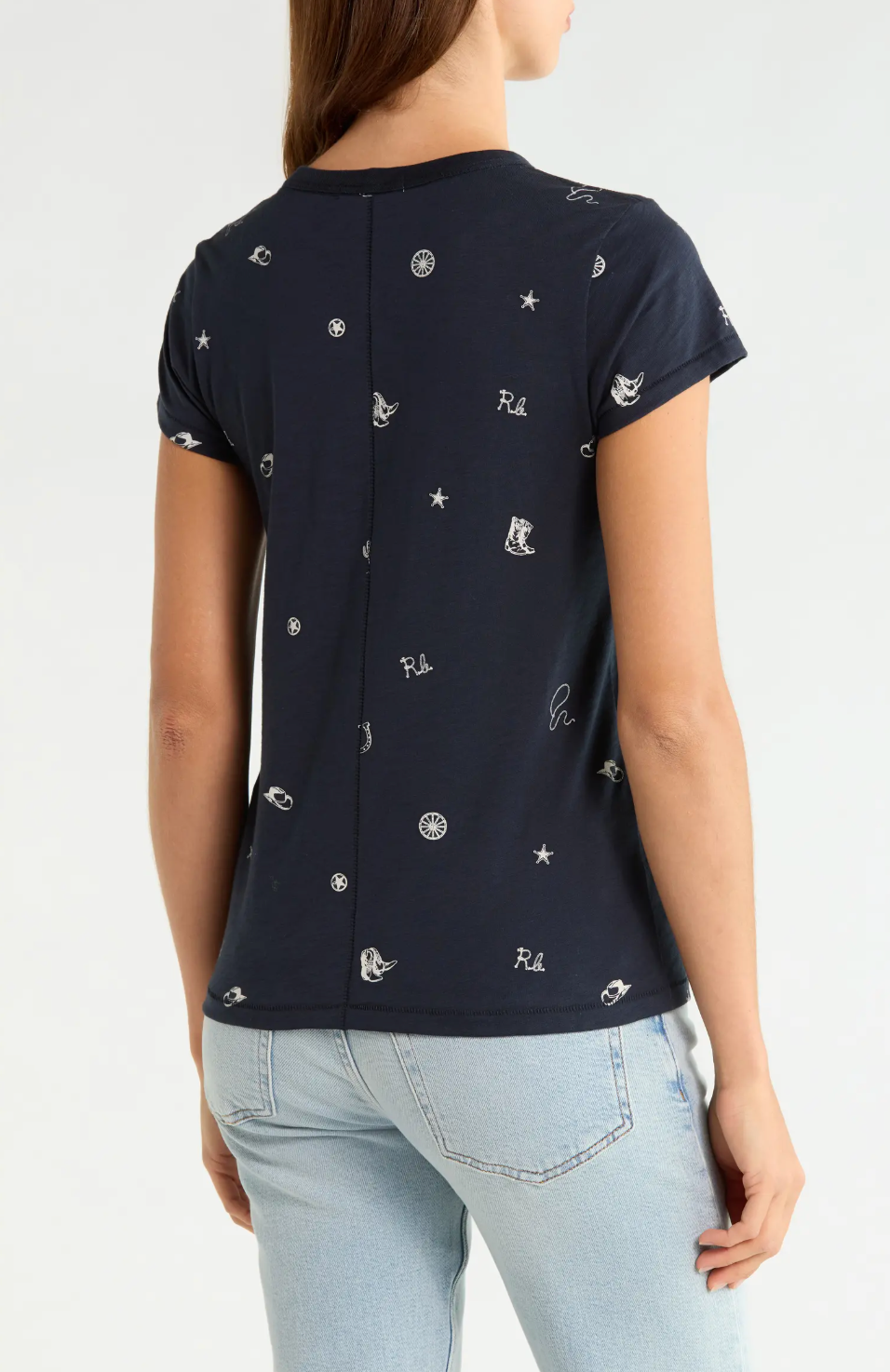 Navy Rag & Bone rodeo tee with white embroidery, styled with light blue jeans, shown from the back.