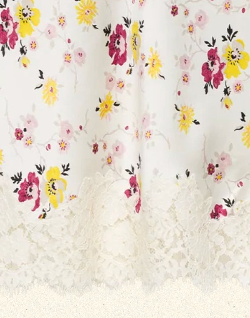 Bias-cut midi skirt with Sweetbriar floral print and scalloped white lace hem by DOEN, feminine and airy style.