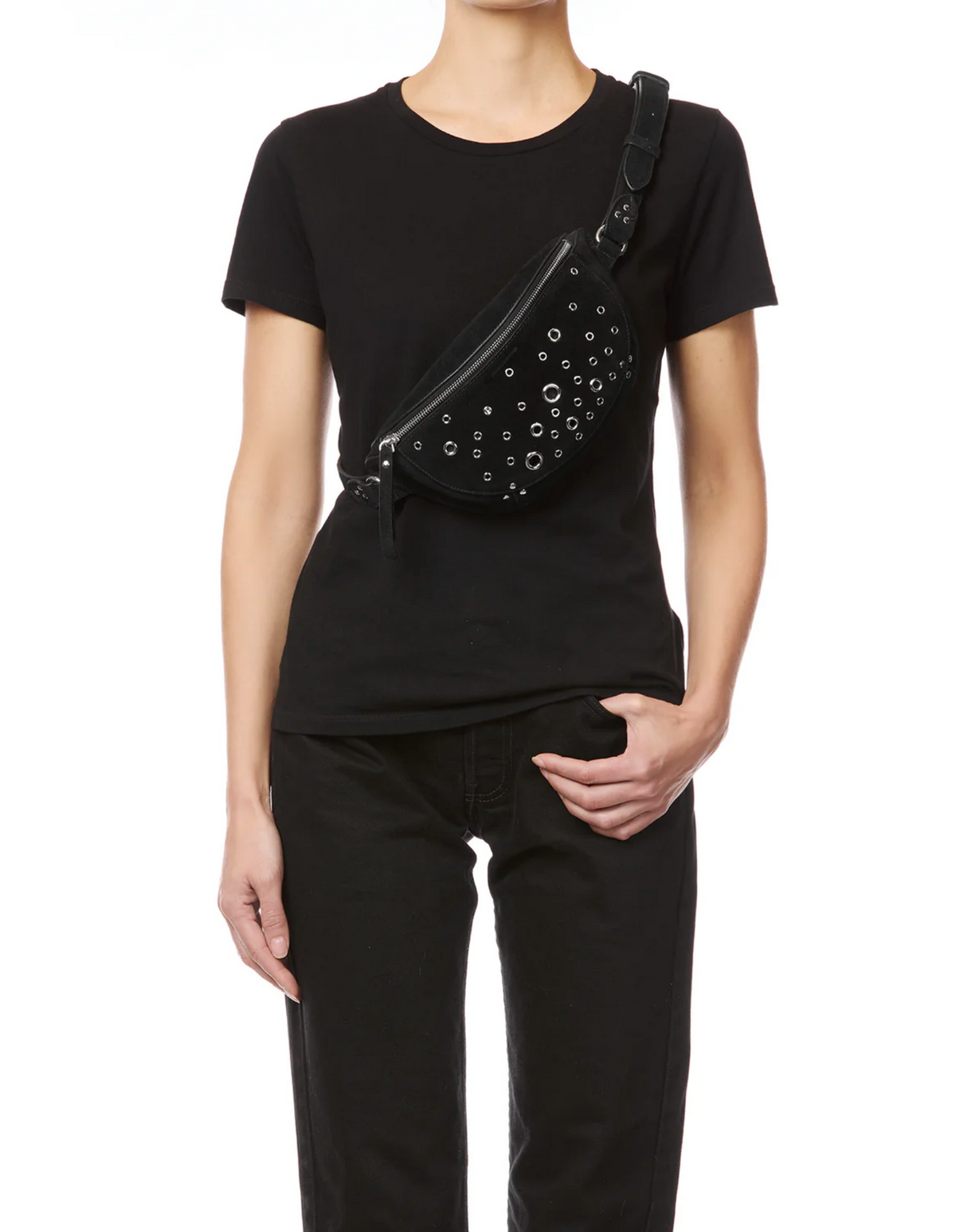 Jerome Dreyfuss Lino Banane black bag with silver eyelets styled with black t-shirt and pants, hand in pocket.