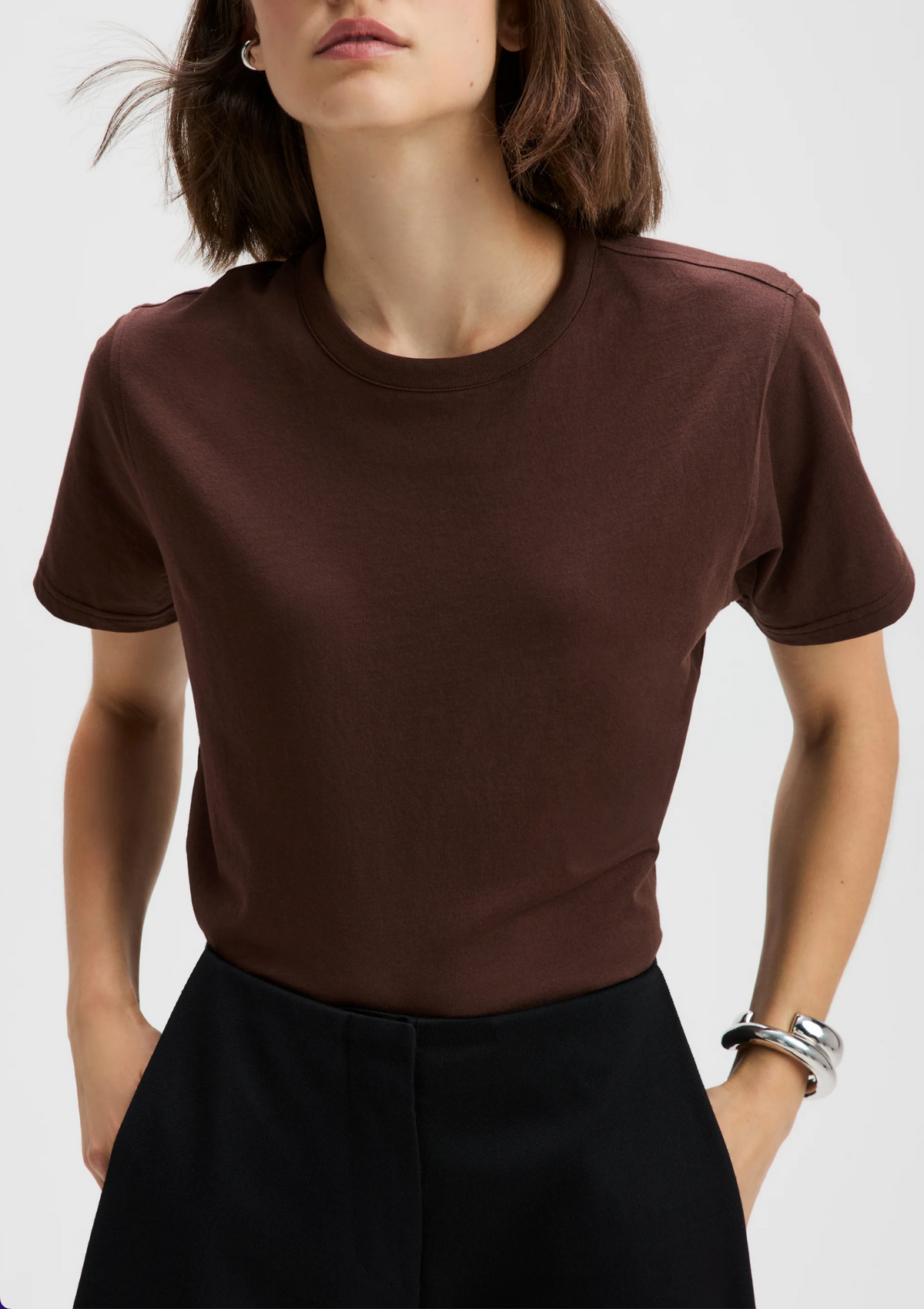 Dark brown organic cotton crew neck tee with black pants, Sold Out NYC Iconically Soft Perfect Tee.