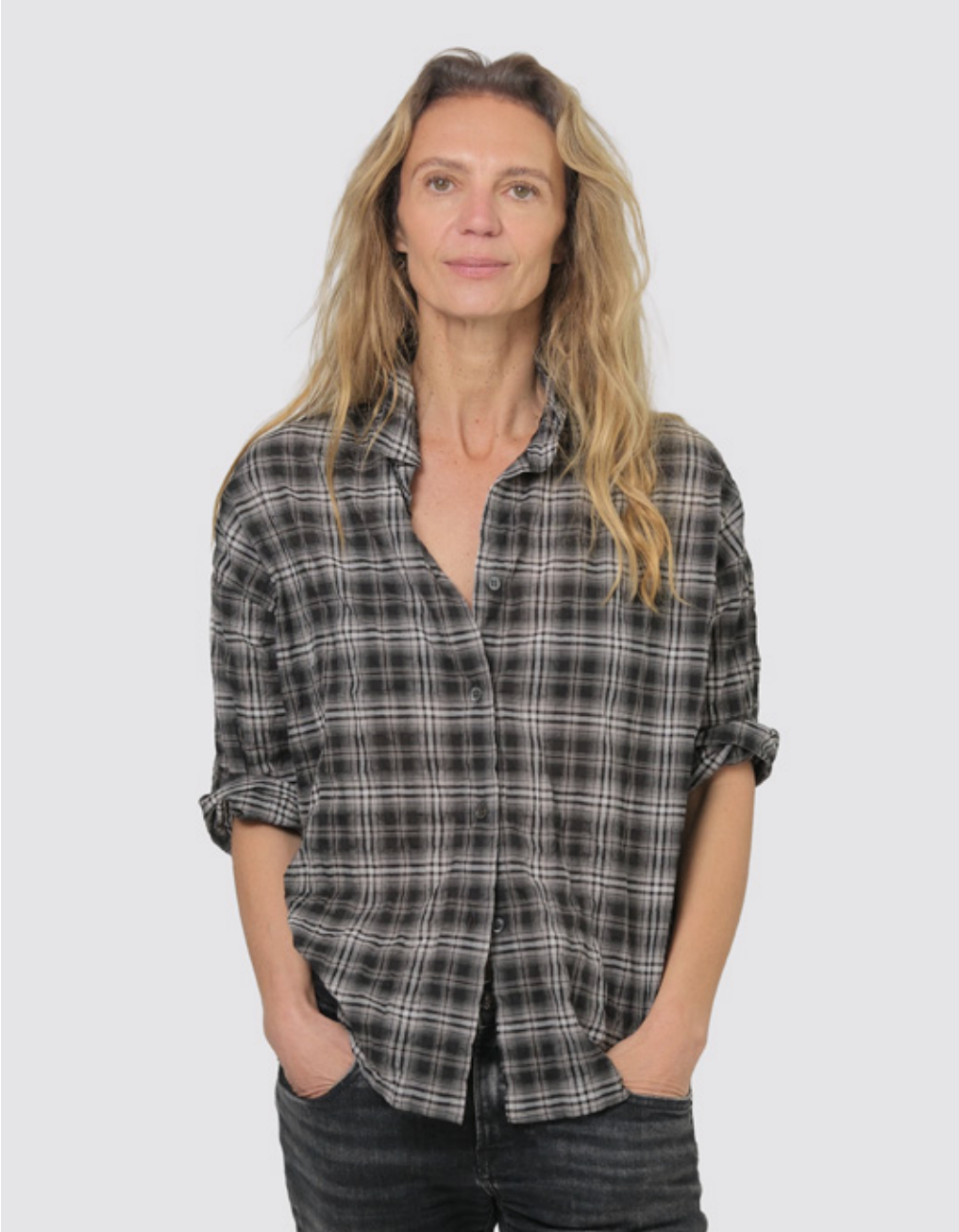 Miles Shirt Plaid in black and white Japanese cotton, worn with rolled sleeves.