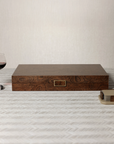 Palma de Mallorca backgammon set in closed wood veneer with metal latch, styled with red wine and coasters.
