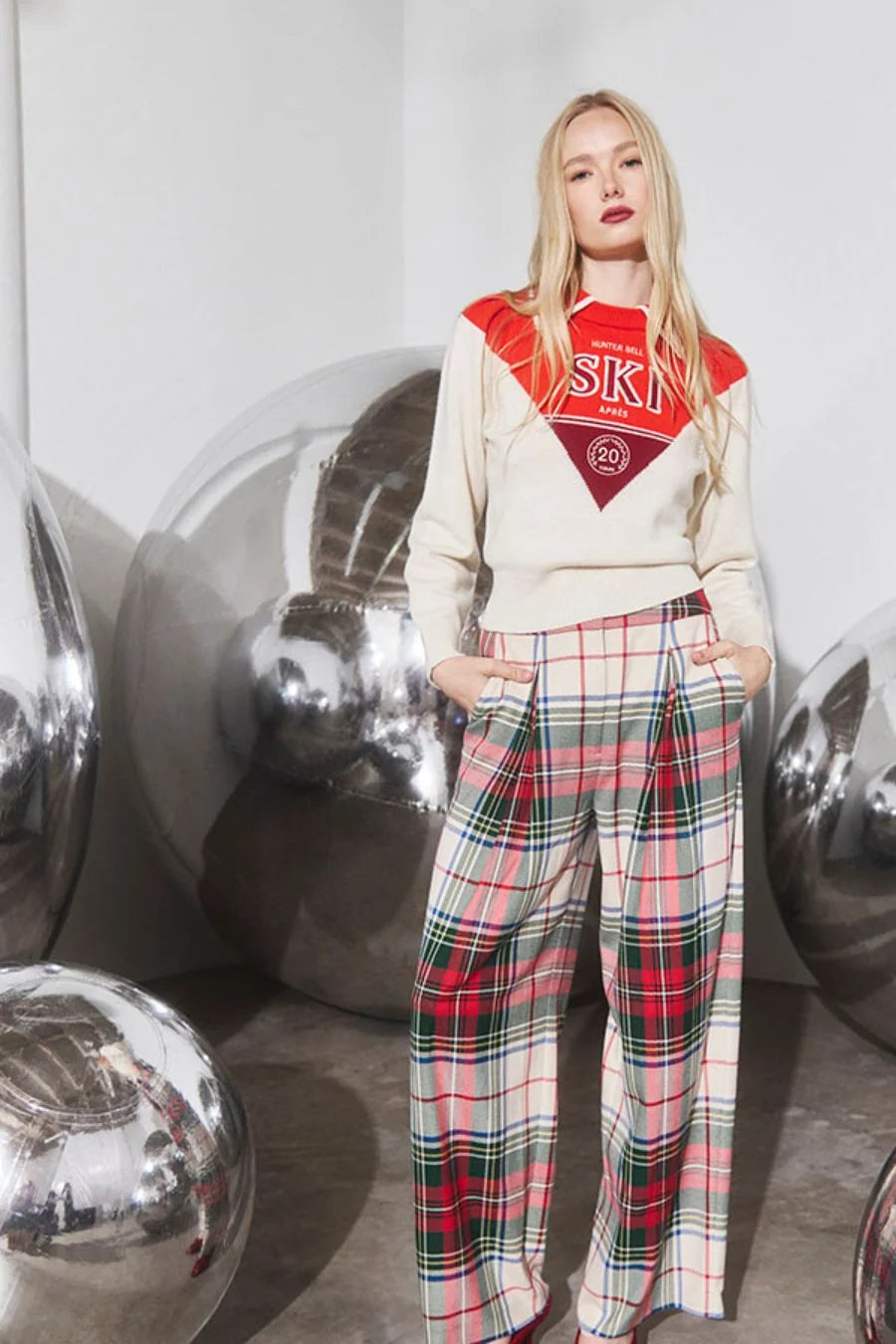 Red and white après-ski sweater and wide-leg plaid Ridley Pant with front fly zipper by Bungalow.