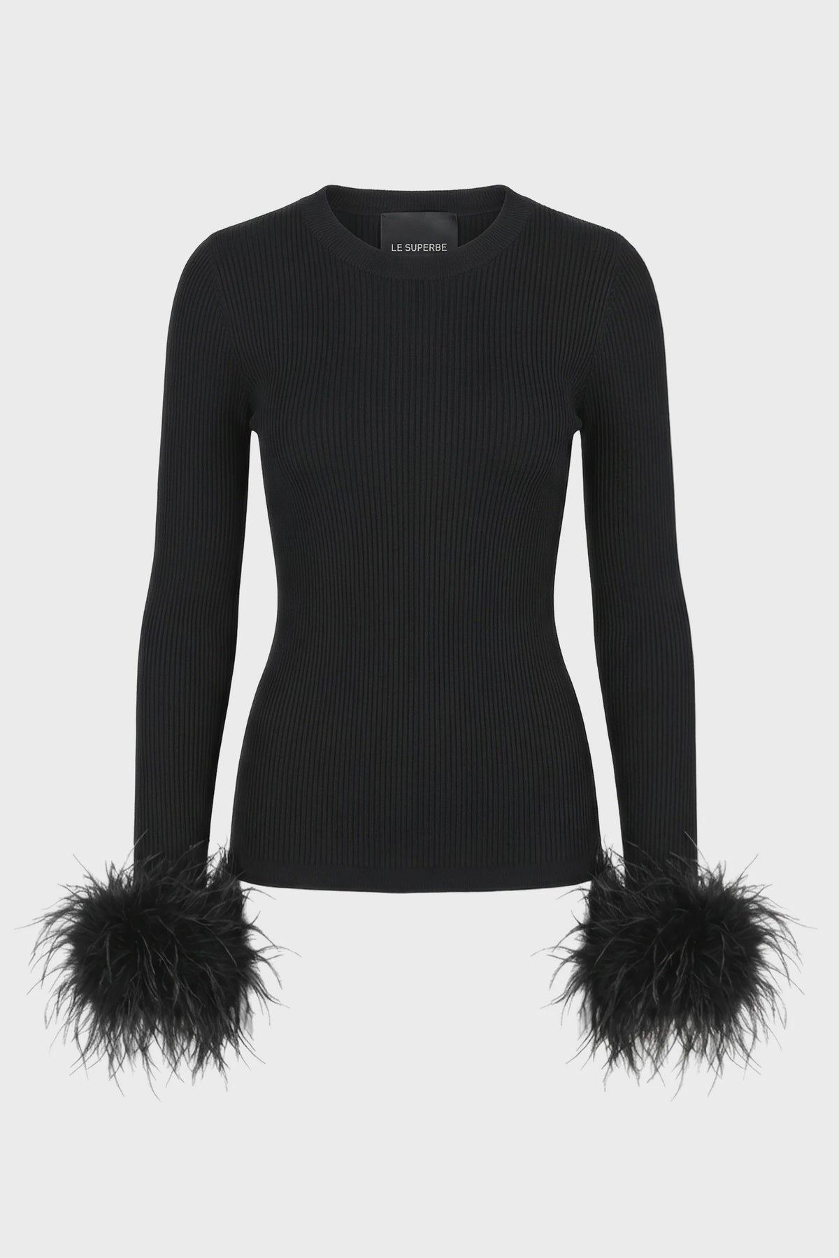 Black ribbed crew neck sweater with feather-trimmed cuffs by Le Superbe.