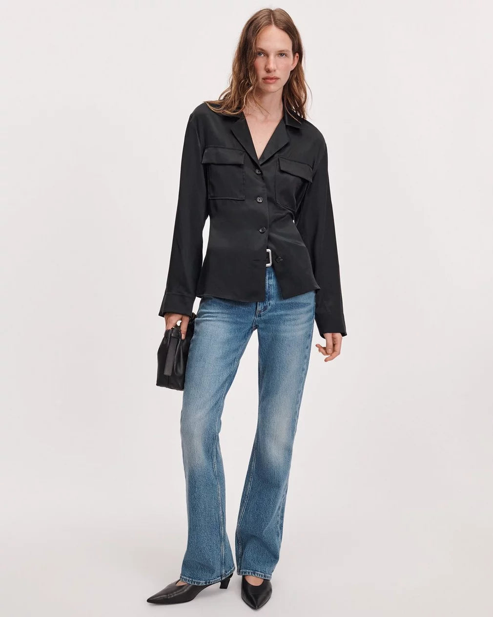 Rag & Bone Sonny silk blouse in soft ivory, styled with blue jeans and black pointed shoes, urban casual look.
