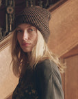 The Striped Beanie by Bungalow Furniture & Accessories, a vintage wool winter hat with brown and black ribbed stripes.