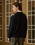 Vintage 1970s navy blue wool blend cardigan with cream and burgundy argyle pattern from Bungalow Furniture & Accessories.