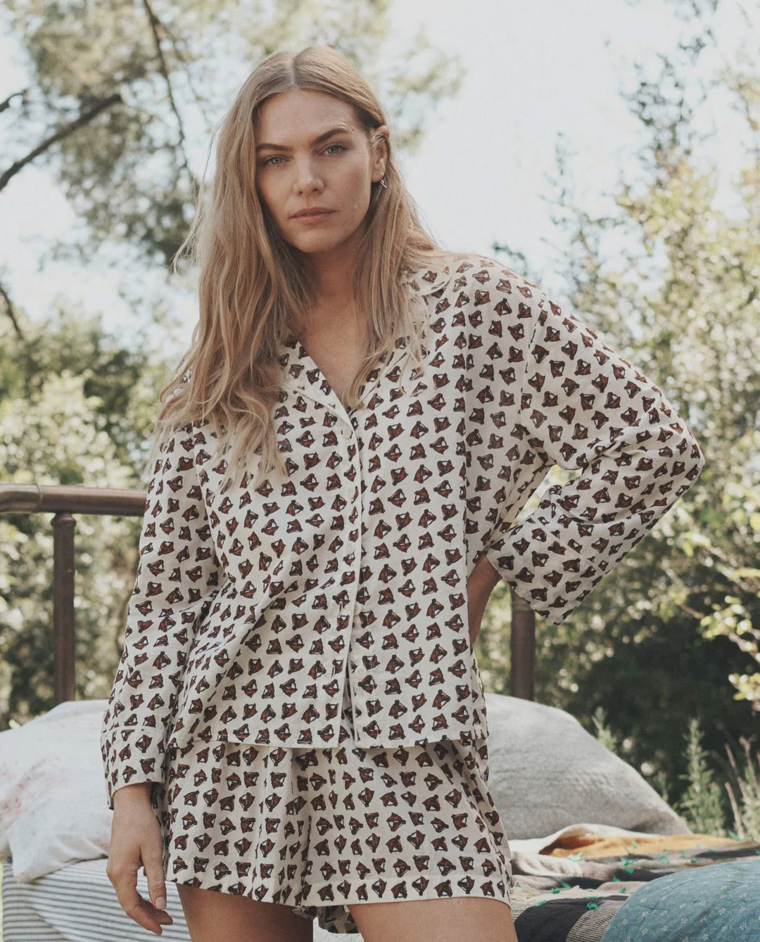Long-sleeved button-down shirt and The Flannel Smocked Sleep Short with bear pattern from Bungalow Furniture & Accessories.