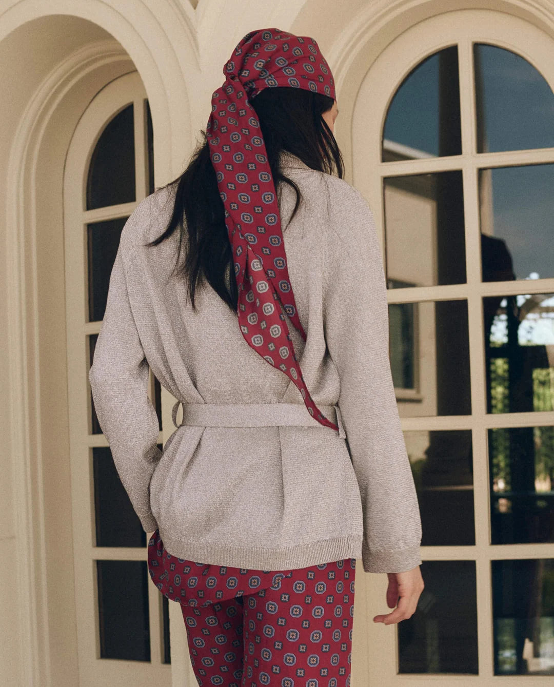 Lurex Commander Riding Cardi with matching patterned pants and headscarf, styled with a belted shawl collar.