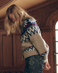 Winter Fairisle Cardi in beige alpaca yarn with a blue and red Nordic yoke pattern by Bungalow Furniture & Accessories.