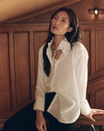 The Pleated Neck Tie styled with a white button-down shirt in a vintage menswear look by Bungalow Furniture & Accessories.