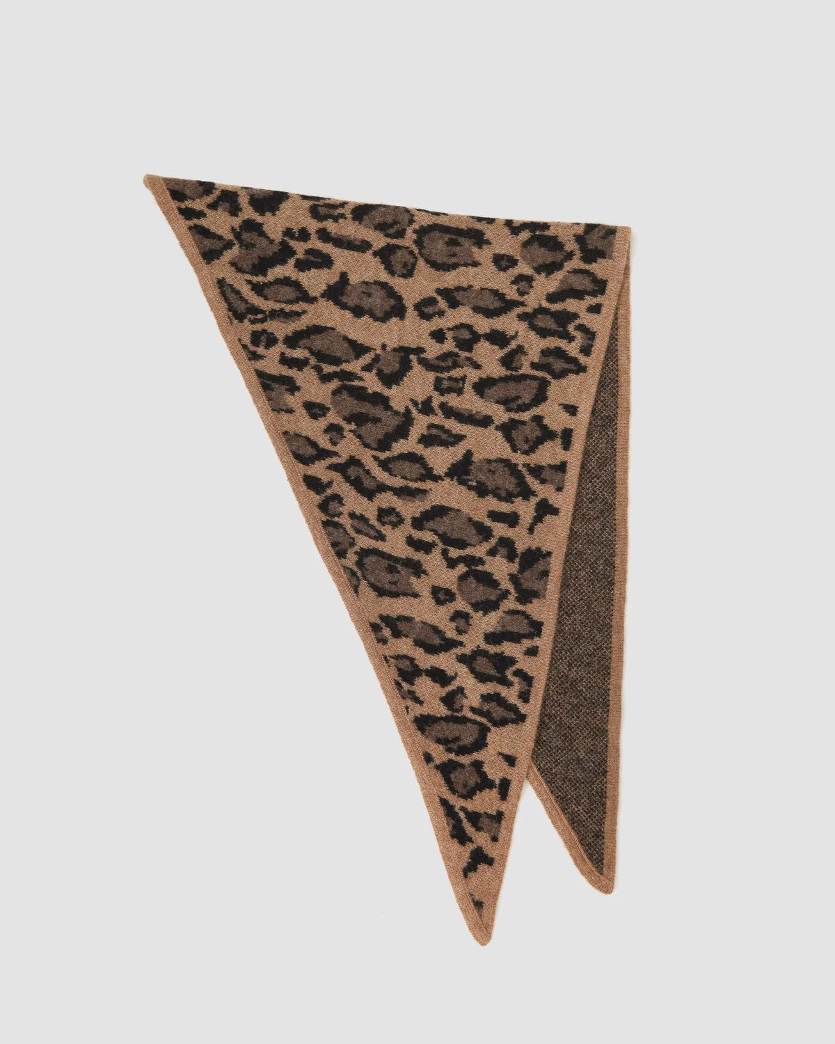 Leopard print triangle scarf in baby alpaca wool by Clare Vivier.
