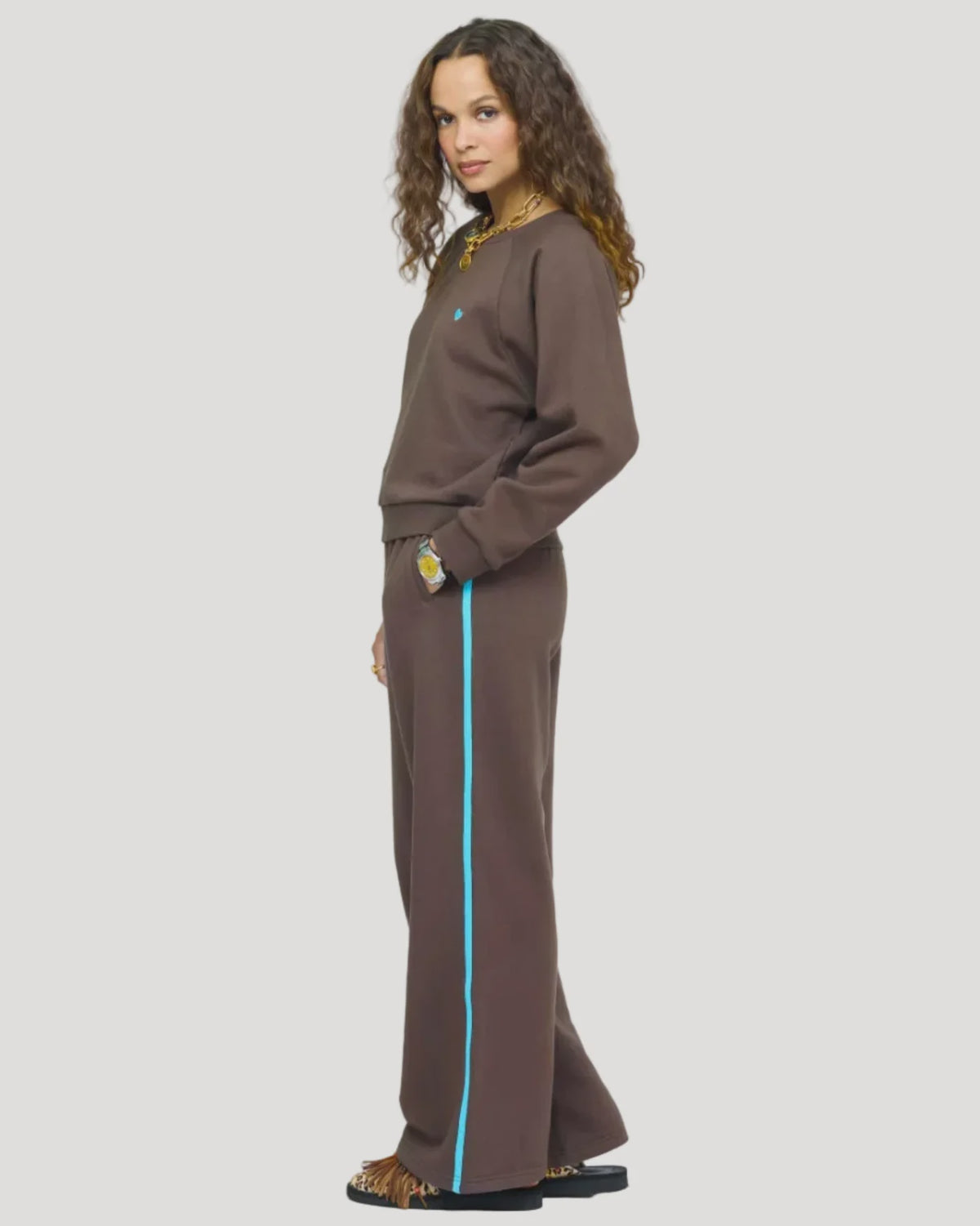 Chocolate brown Kerri Rosenthal True Sweatshirt with blue heart and matching wide-leg pants with blue stripe.