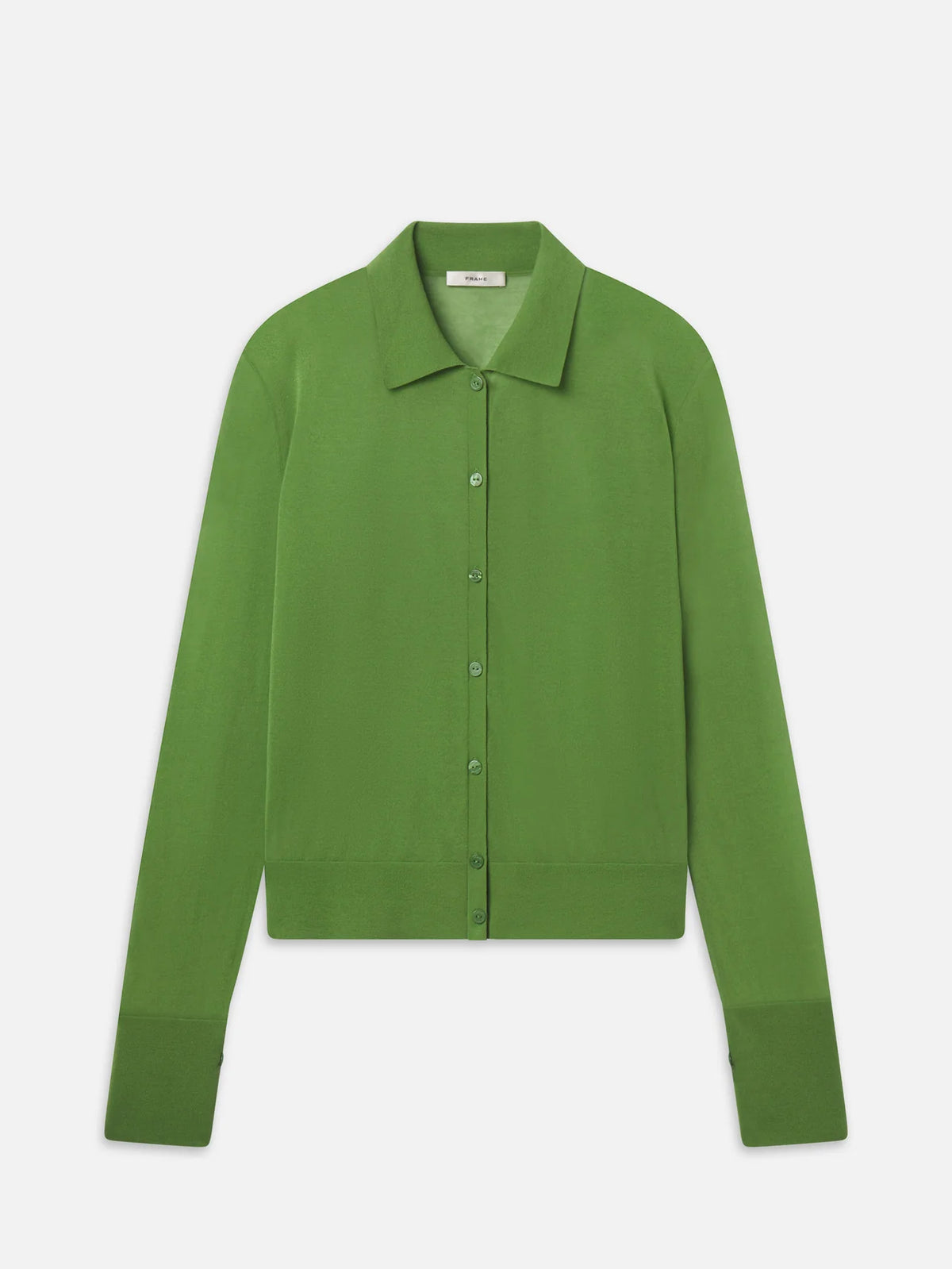 The Collared Cardi by FRAME is a lightweight, long-sleeve, button-up cardigan in a solid green cotton blend, shown laid flat on a white background.