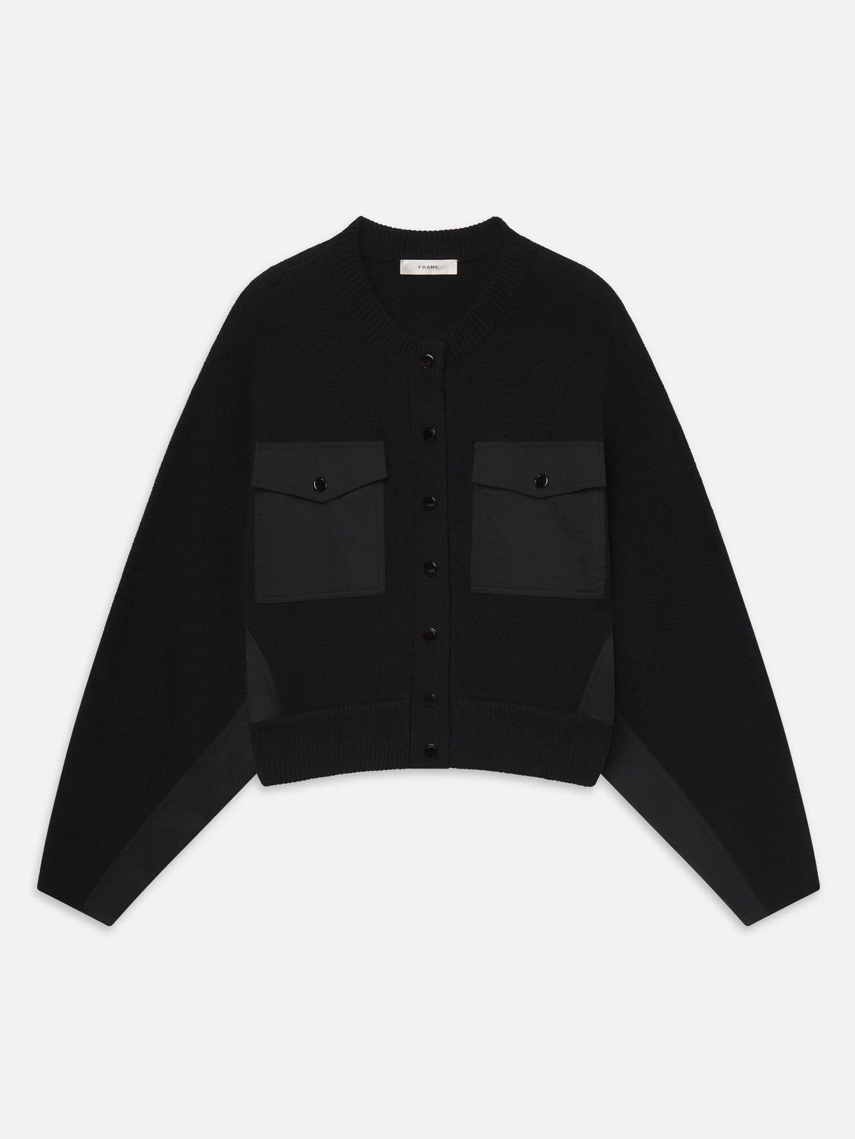 Black cropped cashmere cardigan with buttons and flap pockets by FRAME, perfect for layering in modern spaces.