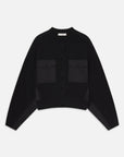 Black cropped cashmere cardigan with buttons and flap pockets by FRAME, perfect for layering in modern spaces.